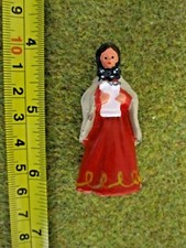 unknown-manufacturer-woman-in-cloak-singing-carols-figure-christmas-village
