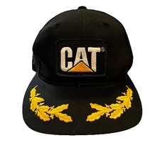 CAT Letters in White w Gold Logo Triangle & Bill Accents Black Trucker Hat Cap
