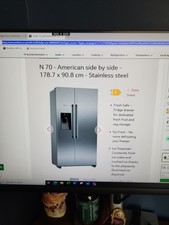 Brand new - still in unopened  box - Neff KA3923IE0G American Style Refrigerator
