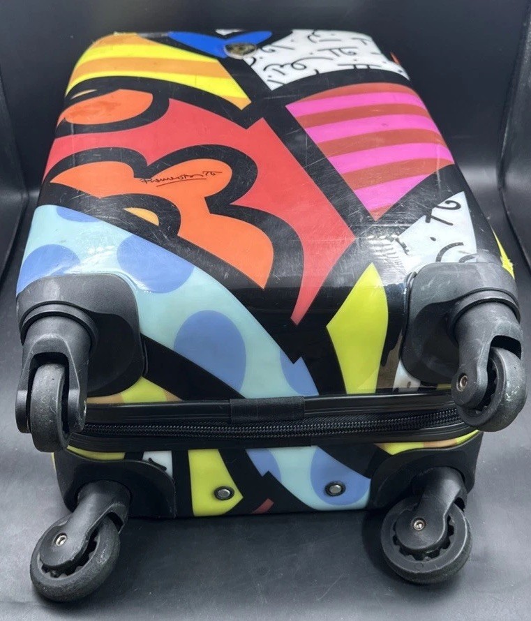 Heys A New Day 21" Transparent Carry On Luggage Spinner Romero Britto Hard Shell