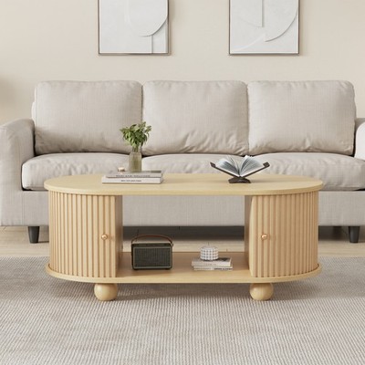 Couchtisch oval 100x50x40cm Holzoptik Stauraum Schiebetüren gerillt bis 30kg
