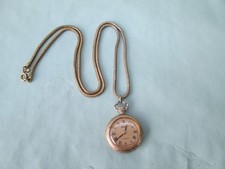 GOLD TONE SWISS MADE ZALES MECHANICAL HAND WINDING PENDANT WATCH & CHAIN