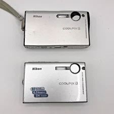 Nikon Coolpix S6 6.0MP And Nikon Coolpix S9 6.0MP Silver Digital Camera