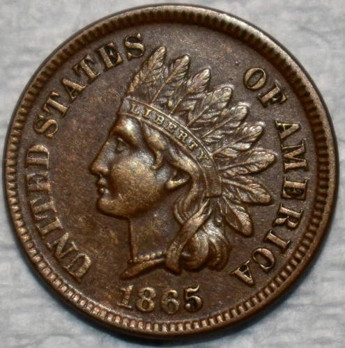 About Uncirculated 1865 Indian Head Cent, Lustrous, Chocolate-Brown specimen.