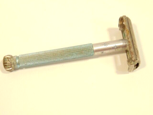 older Gillette safety razor with pale blue handle grip and star accents