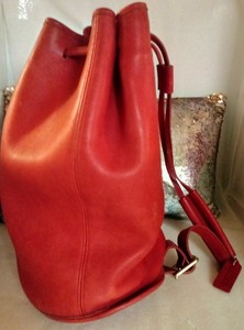 coach red sling bag
