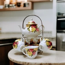 White Ceramic Tea Set Red & Yellow Rose Teapot and Matching Cups on Metal Stand