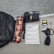 Olympus C-4040 Zoom 4MP Digital Camera Kit + 8MB SmartMedia Card Bundle