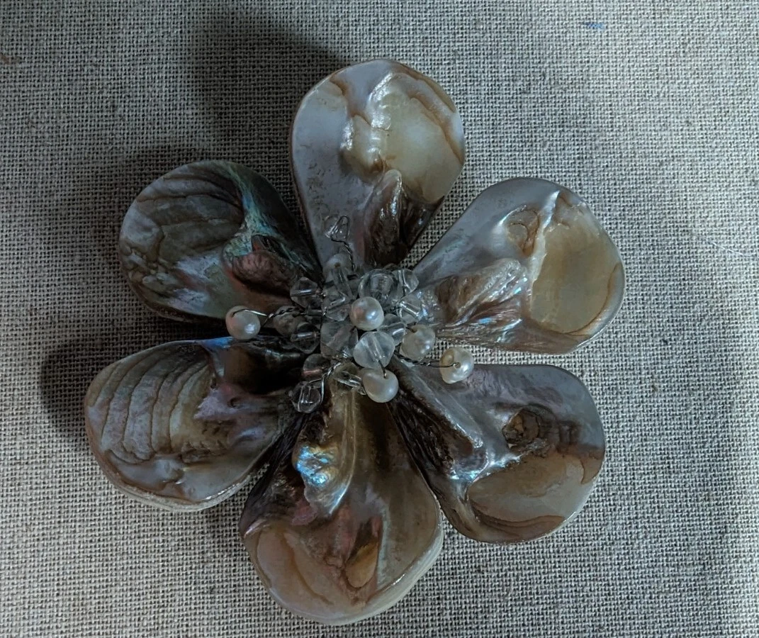 Silver flower shop brooch