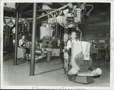 1957 Press Photo Sally Barnes and Vivian Chris drive Yale's electric hoists