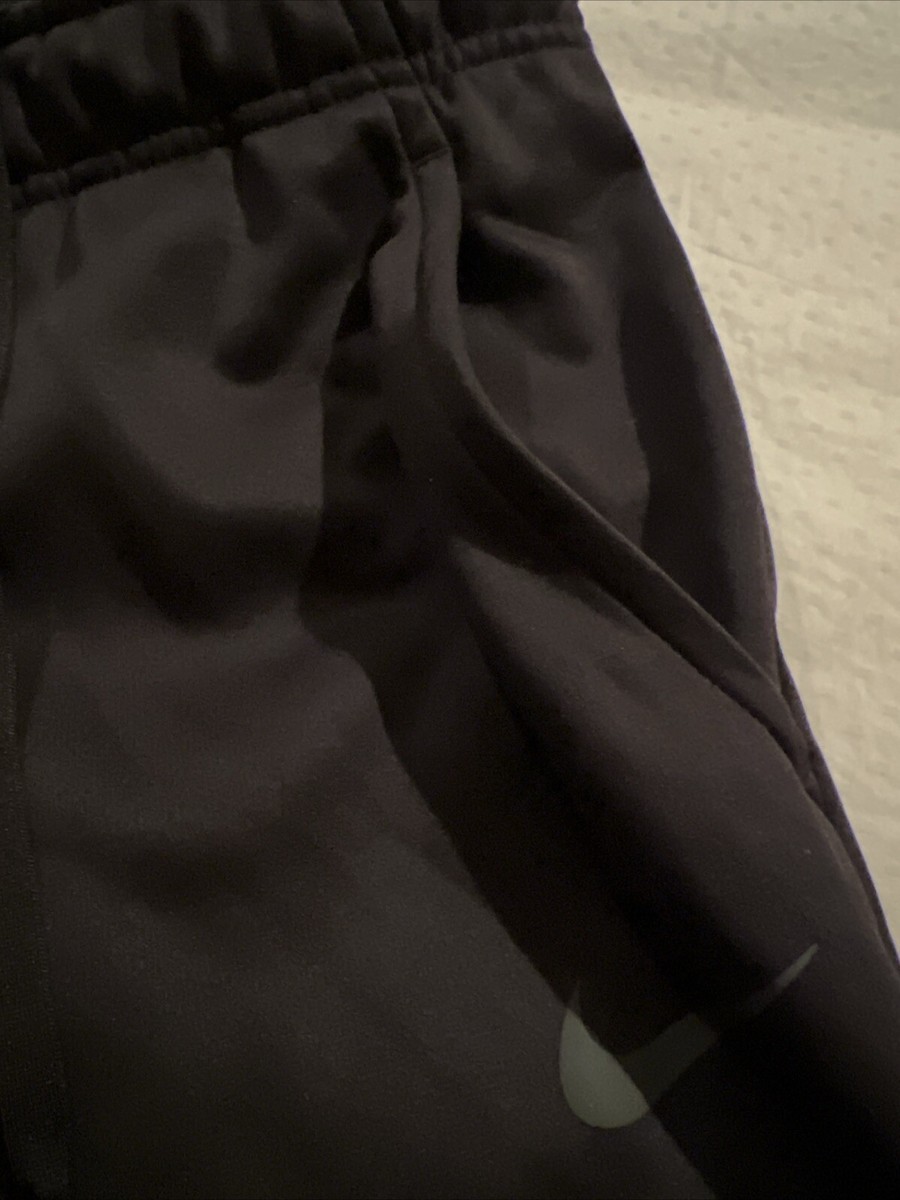 nike training tall therma tapered joggers in black