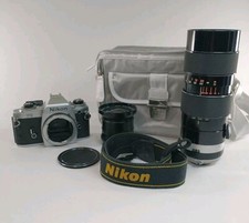 Nikon FG 35mm SLR Film Camera 28mm Lens 70-220mm Lens Strap  Camera Bag Tested