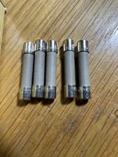 A lot of FIVE (5) BUZZMANN BK/MDA-15, 15A 250V slo-blow Ceramic fuses