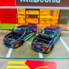 2Pcs 1:64 Pop Race Nissan Skyline GT-R R33 Magic Chrome Foshan APA Expo 2025