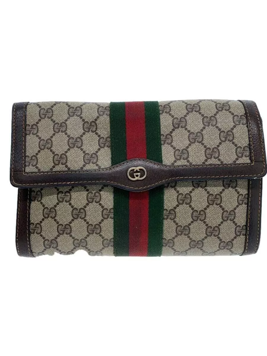 Sac pochette GUCCI PVC beige motif total PARFUMS ceinture pièce tache occasion