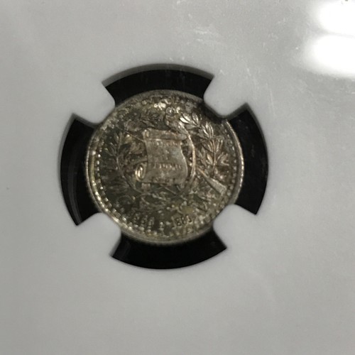 1880 / 770 E Guatemala Silver 1/2 Real NGC MS-65 toned - Picture 4 of 4