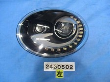 Faro proiettore sinistro