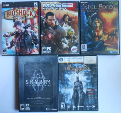 5 PC VIDEO GAME LOT BIOSHOCK SPELL FORCE BATMAN SKYRIM MASS EFFECT 2 MANUALS MAP