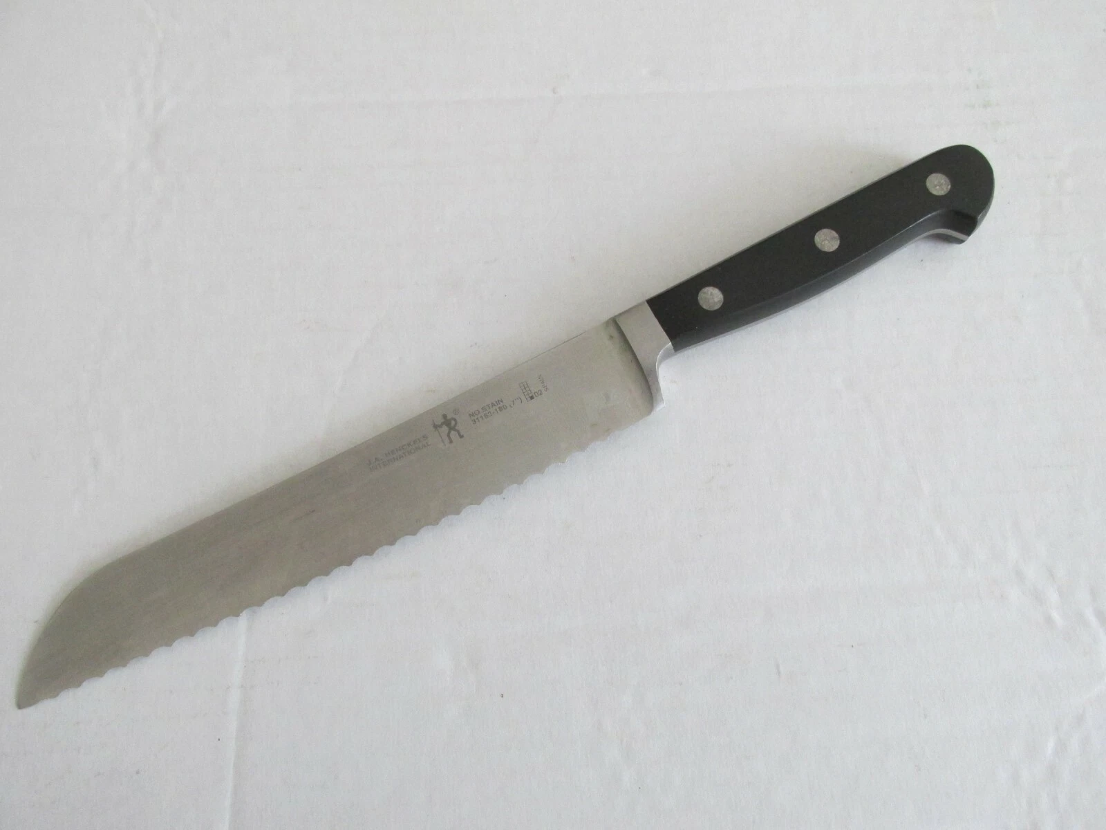 J.A. Henckels International Spain Stainless Steel Serrated Knife 31163-180 7"