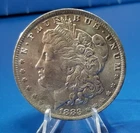 1883-O $1 Morgan Silver Dollar AU  Uncirculated #135