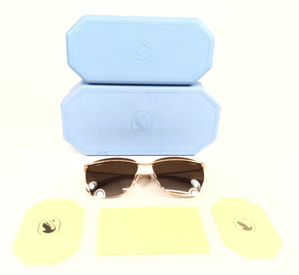 Óculos de sol Swarovski SK7006 403013 ouro rosa com cristais rosa e lentes marrons - Imagem 2 de 4