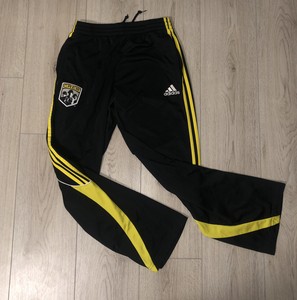 black and yellow adidas pants