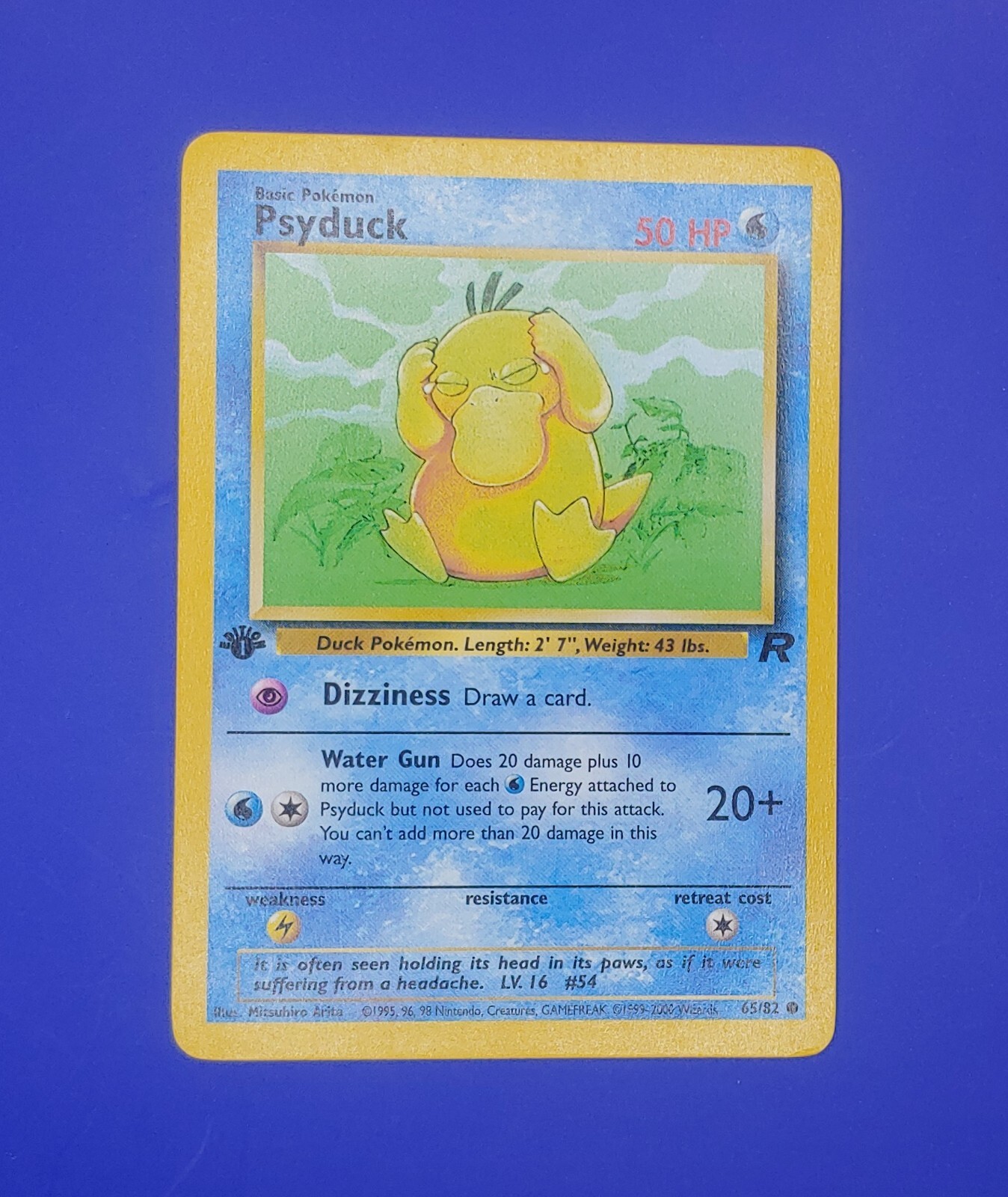 65/82 Psyduck 1ST EDITION - Team Rocket - NM Near Mint Pokemon Card