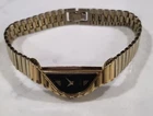 Vintage 1980s Seiko Rivoli Half Moon Watch: Gold Tone, Black Dial, Asymmetric
