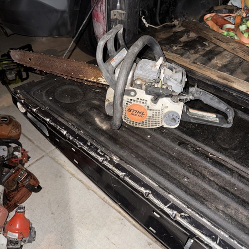 Stihl MS 170 gasoline chainsaw w/ chain brake orange white black