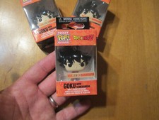 LLAVERO DE BOLSILLO FUNKO POP DRAGON BALL Z GOKU CON KAMEHAMEHA CAJA METÁLICA ALMUERZO