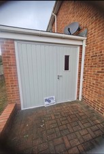 insulated Side hung Vertical rib with 1x window Agate Grey door FULLY FITTED