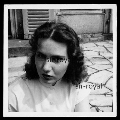 Pretty woman looks annoyed at the camera-GDR-photo 7x7cm