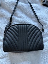 ladies small black cross body bag by F&F. Zip fastening, stitched detail on fron