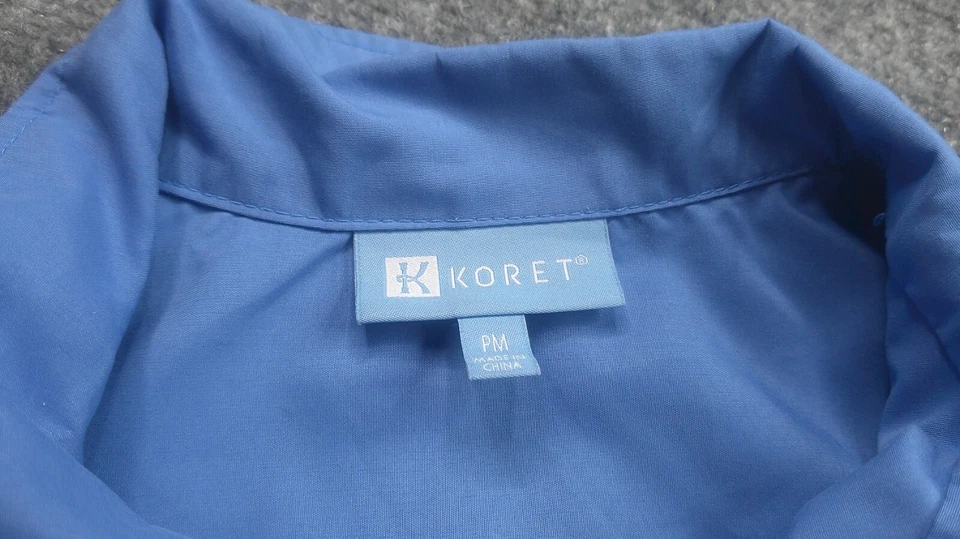 Traje de chándal Koret para mujer PM azul rompevientos 2 piezas chaqueta pantalones ocio correr Foto 2 de 4