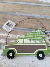 Primitives by Kathy car bringing the tree ornament access holiday tree