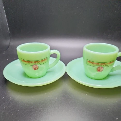 2-vtg cup & saucers FireKing Jadeite  the Northwestern Bottle  in St. Louis, Mo.