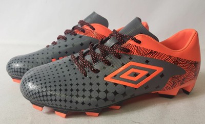 gray and orange soccer cleats