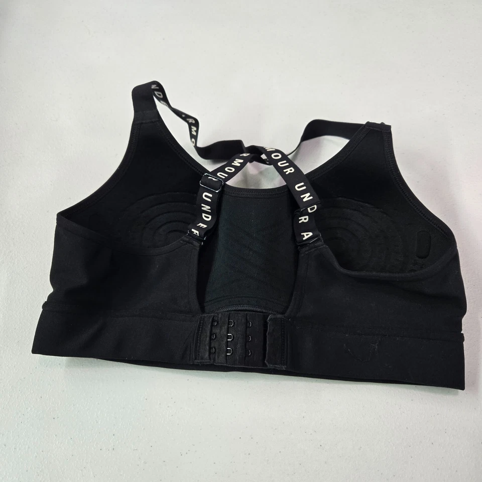 Sujetador deportivo Under Armour para mujer pequeño negro HeatGear ajustado acolchado malla logotipo Foto 4 de 4