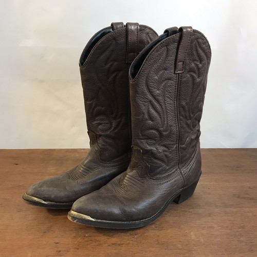 brown and black cowboy boots