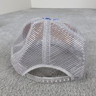 Gray US Air Force Indian Chief trucker hat with mesh back and silver mounting hardware on a gray carpet surface.