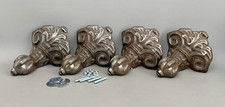 Four cast iron feet for a roll top bath