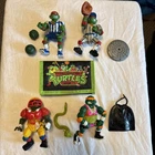 Vintage TMNT sports Ninja Turtles Figures and Accessories Lot with rare wallet!