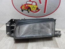 Feu avant (phare) Mazda 323