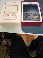 MIYOO Mini Plus Handheld Console – Onion OS + 64 GB Micro SD Card – Excellent