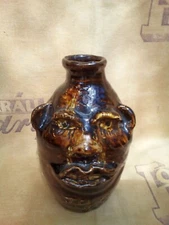  Beautiful Vintage Marie Rogers Face Jug -7 inches tall with a brown glaze.