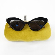 Gucci GG0978S Cat Eye Sunglasses In Black And Gold Frames With Gray Lenses
