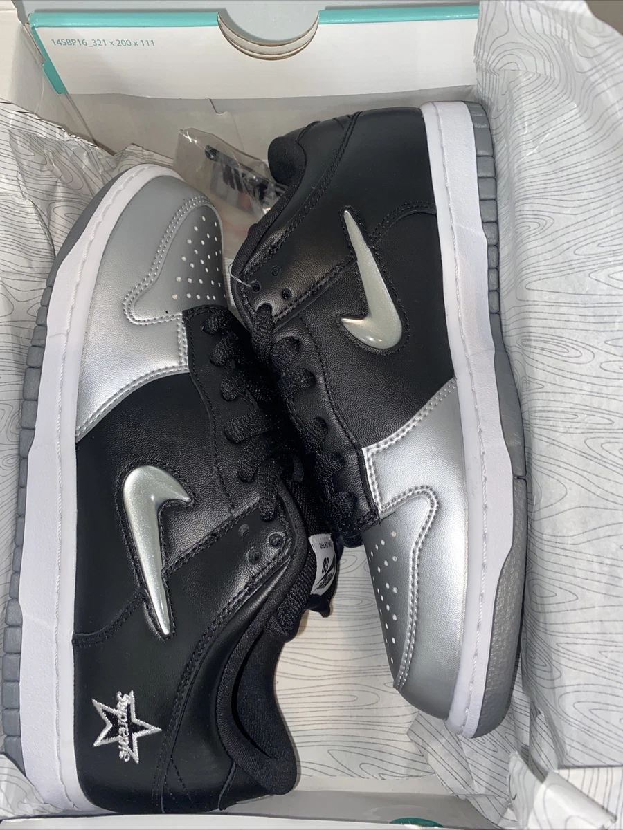 Supreme x nike sb dunk low metallic silver top