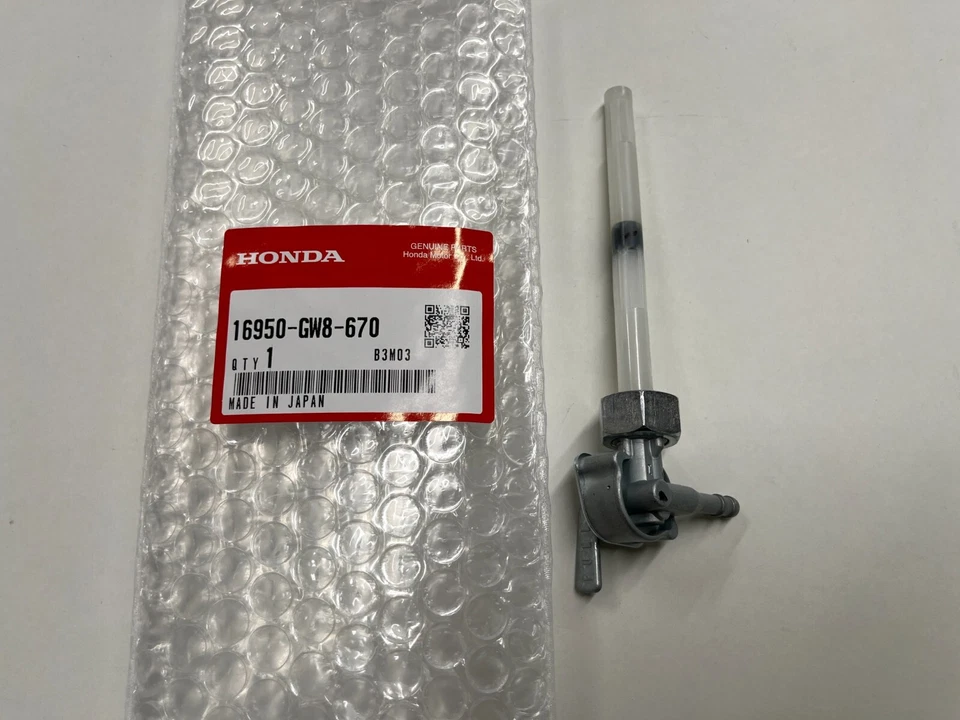 HONDA NOS 81-99 Z50R Z50 82 MB5 OEM GENUINO PETCOCK MONTAJE DE GALLO DE COMBUSTIBLE 16950-GW8-670 Foto 2 de 2