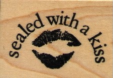 mounted rubber stamp  sealed with a kiss wood mount size 1 1/4" X 1 3/4"