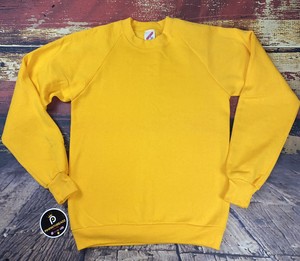 plain yellow sweater